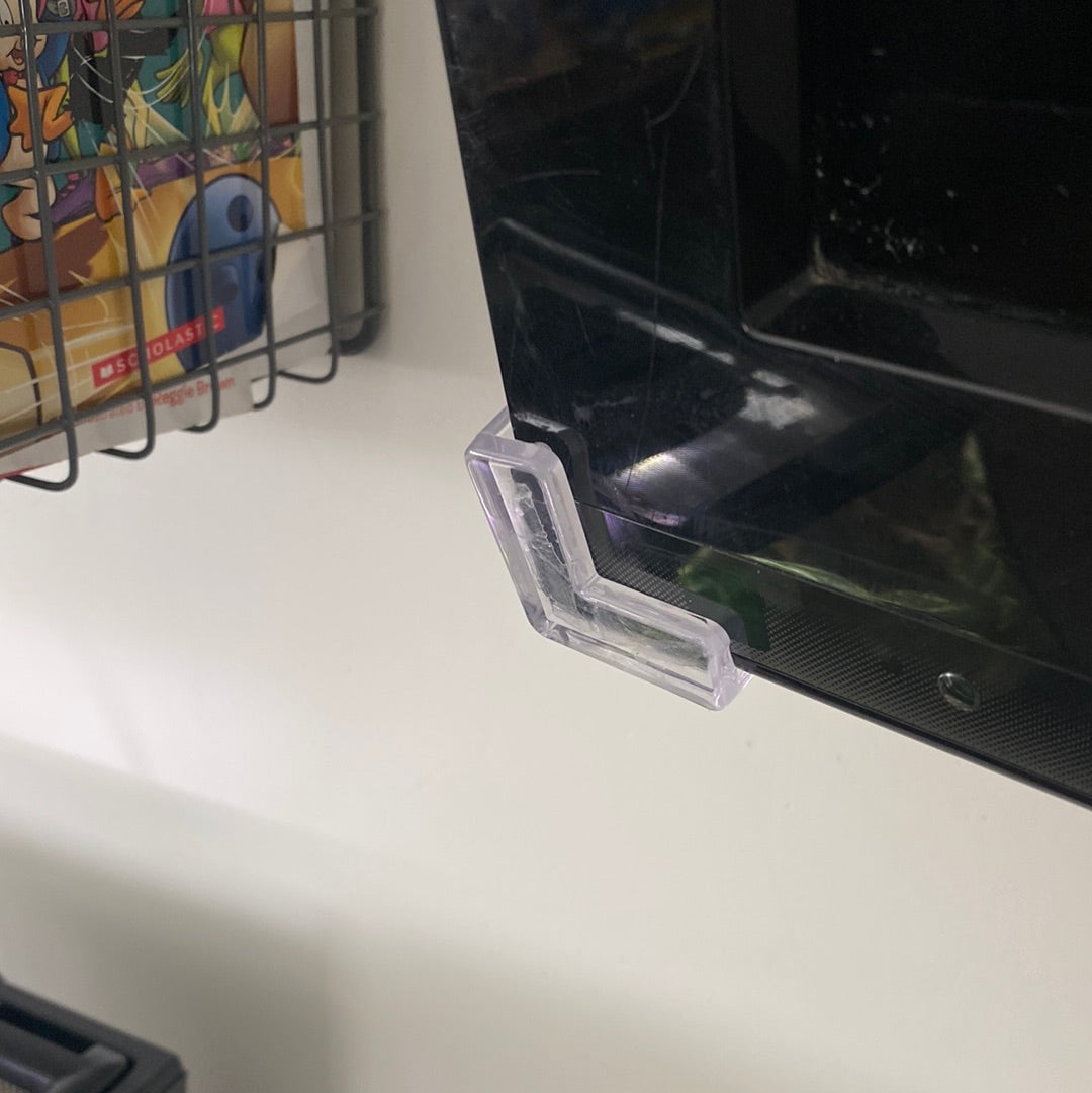 Clear corner guard on the sharp edge of a swivel TV